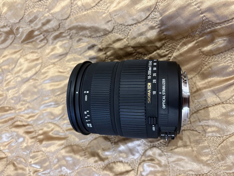 Продам телеобъектив Sigma 18-200mm f/3.5–6.3 DC OS (Canon EF/EF-S)