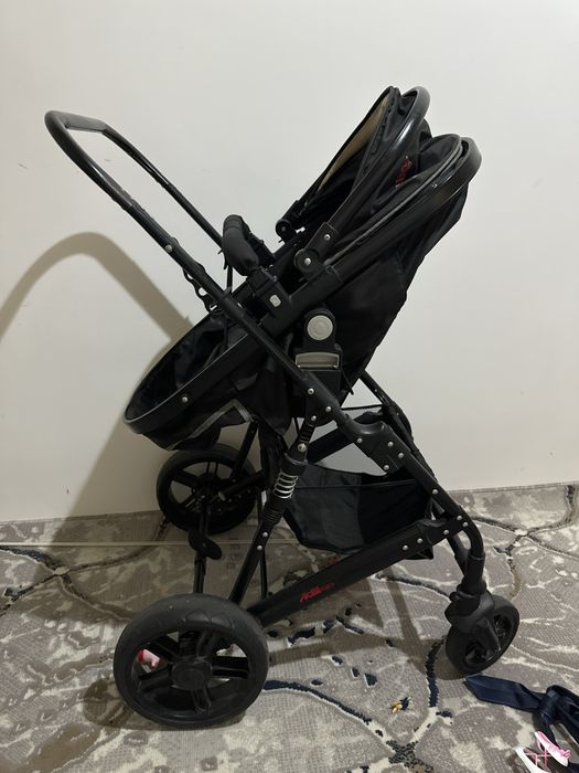 Коляска детская черная высокая