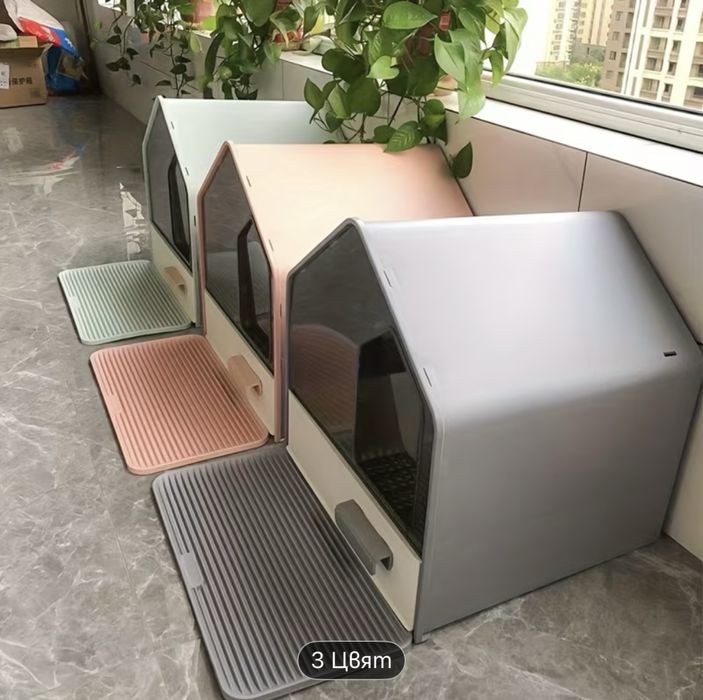 Котешка тоалетна къща