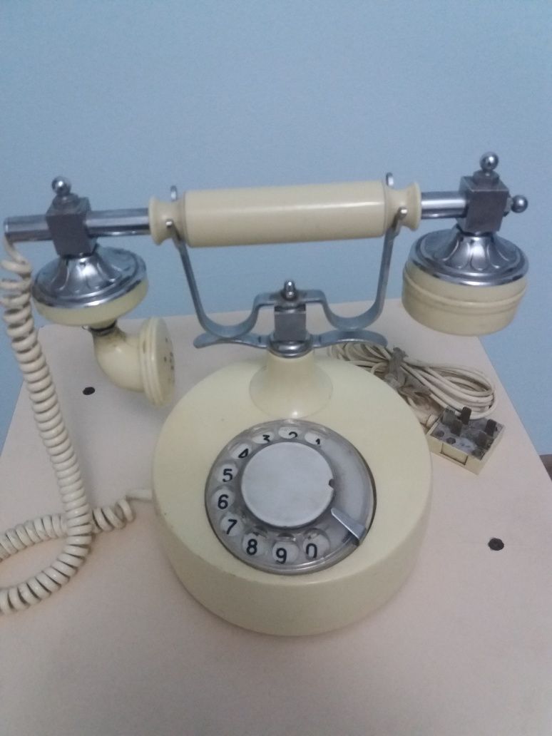 Антиквариат        Телефон.