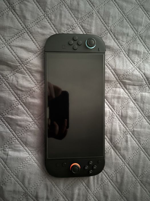 Vand nintendo switch 2 in stare aproape noua