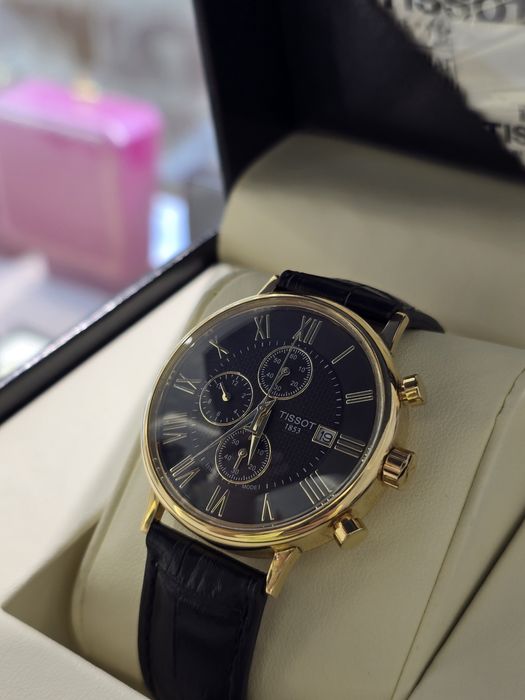 Продам Золотые часы Tissot 750 пробы.