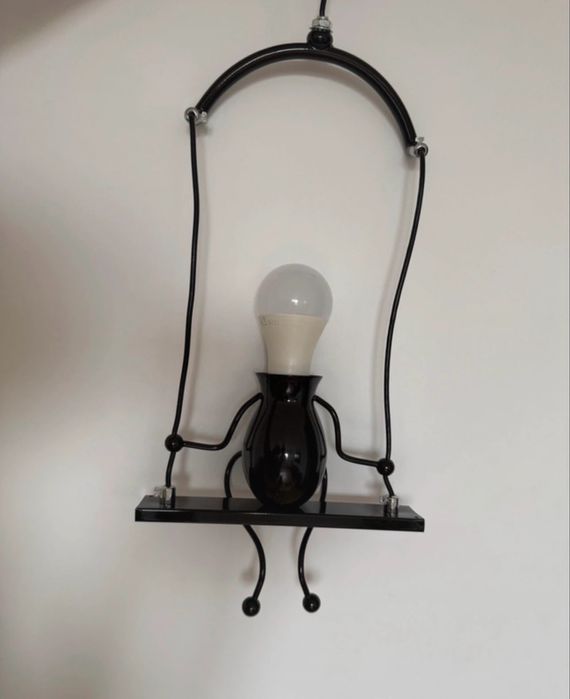 Lampa de perete/tavan în forma de om pe leagan - Noua