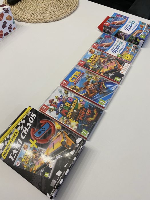 Nintendo Switch пълен комплект + 5 игри и кейс