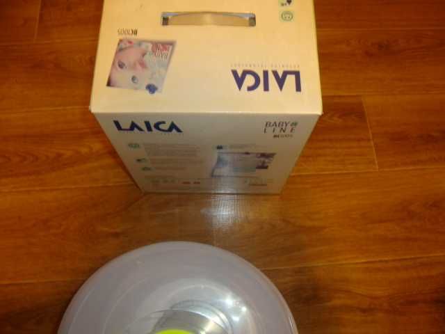 Sterilizator nou de biberoane cu aburi Laica BC1005+încălzitor Laica.
