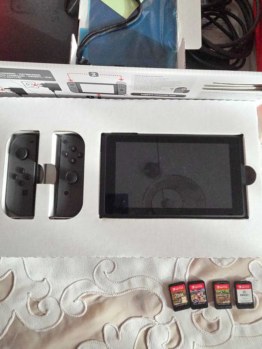 Vand Nintendo Switch + husa + 4 jocuri