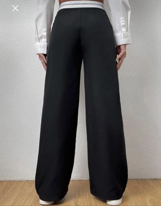 Vand pantaloni eleganti