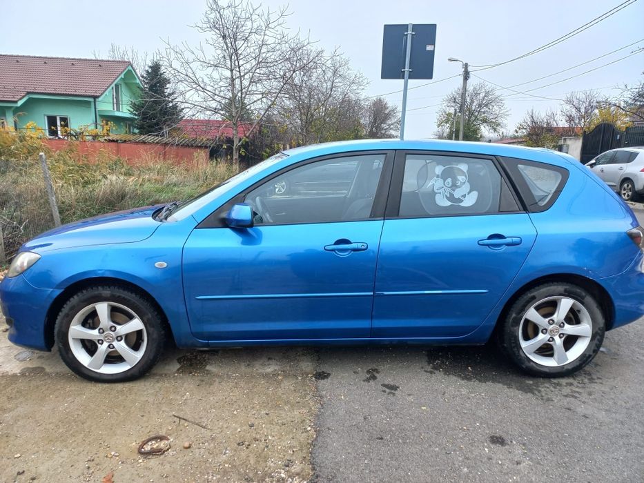 Vand masina Mazda 3