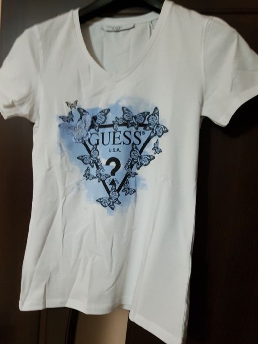 Tricou guess