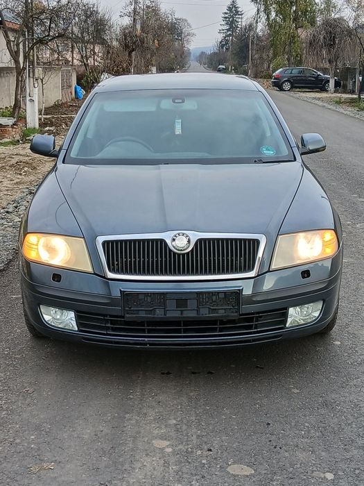 bara aripa use tragar capota grila far stop skoda octavia 2 2007