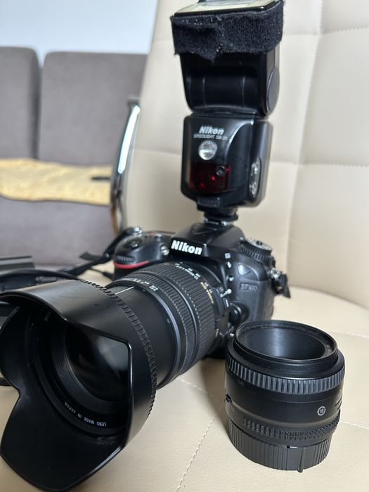 Nikon D7100 body +blit+2 obiective (sigma 17-50 f2.8 & nikkor 50 f1.8)