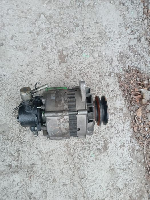 Продам генератор Ниссан мистраль ТД27