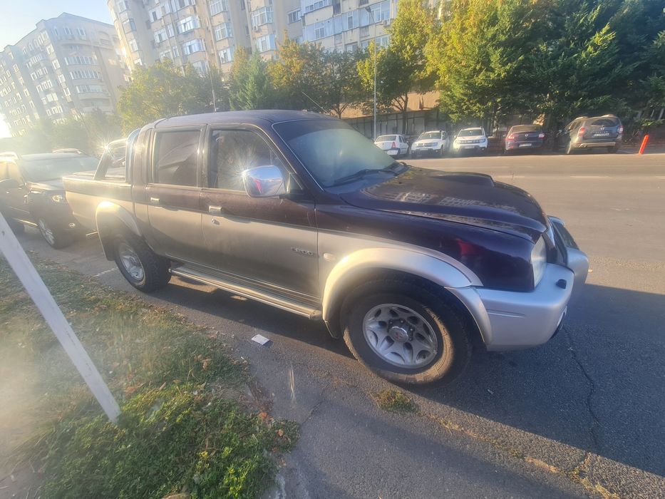 Mitsubishi L200 2005 116 hp