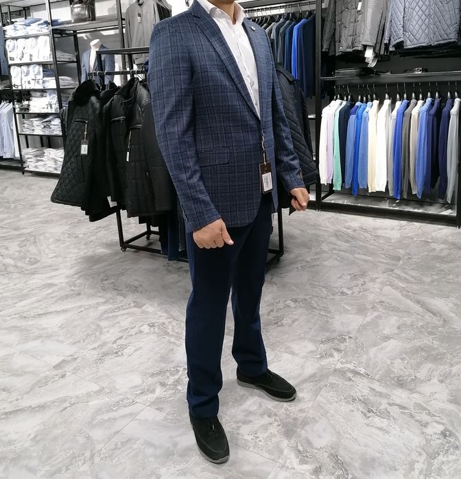 Продам костюм мужской пиджак + брюки 52  размер б/у в отличном состоян