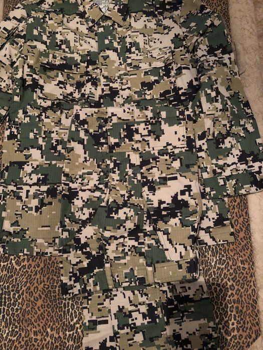 Продам коммуфляж зеленый , новый.