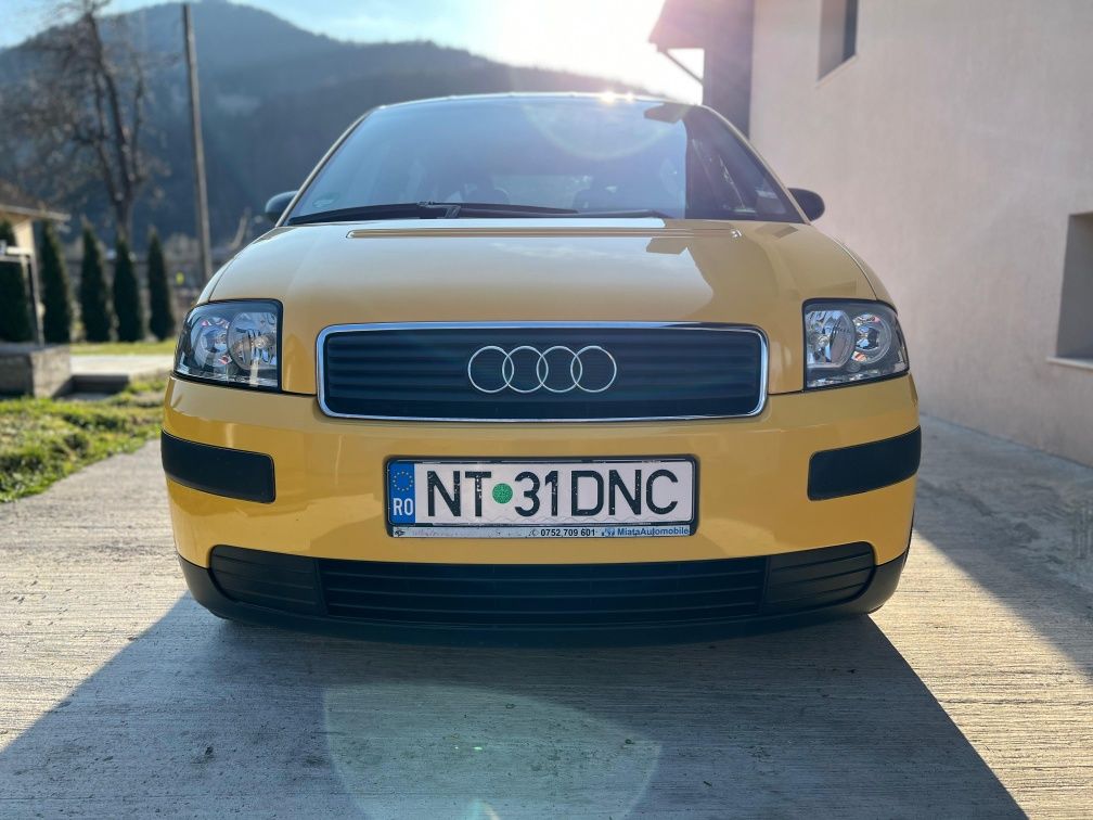 Audi A2 1.6 FSI | 2004 | Benzină | Culoare Galbenă

---

Audi A2
