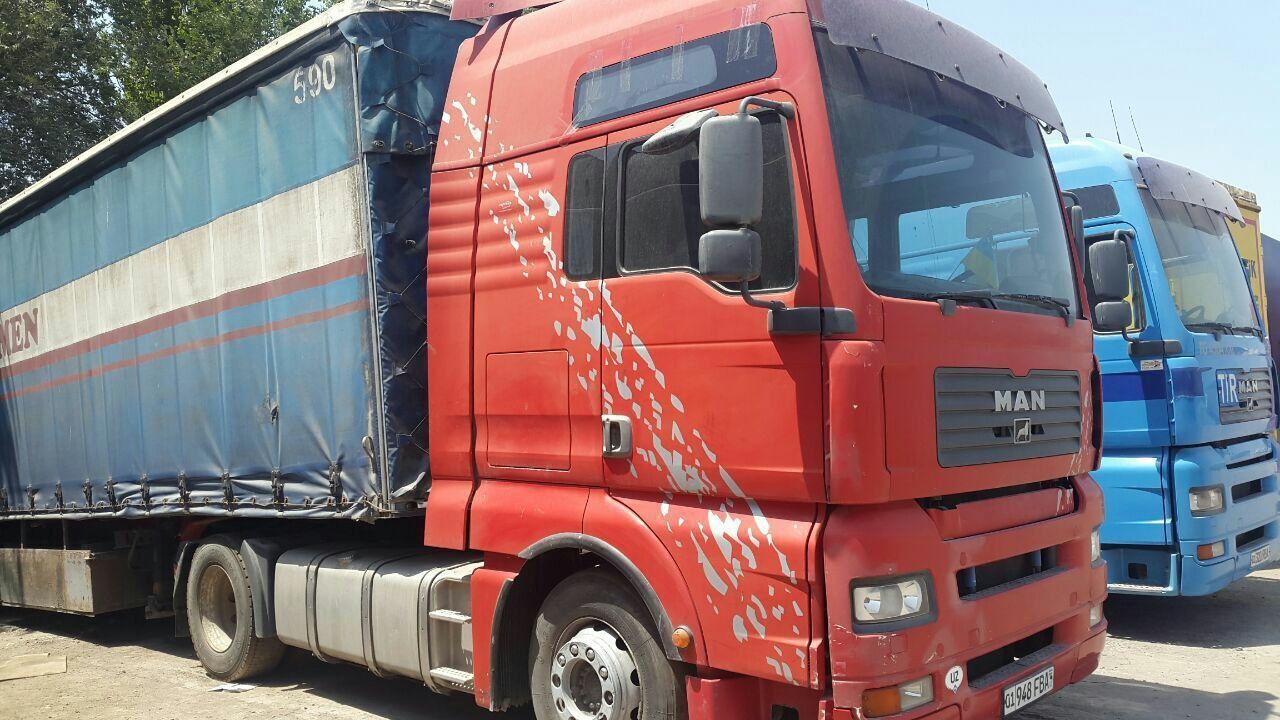 Продается MAN TGA 18.460 с прицепом  SCHMITZ