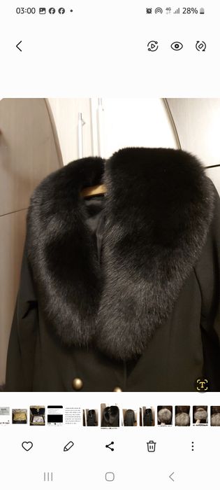 Vând haina din stofa neagra