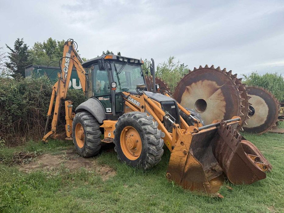 Vand Buldoexcavator Case IH 695SR-4PS