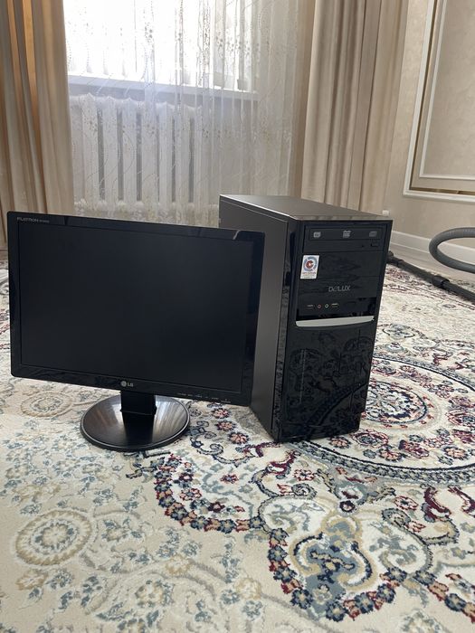 Продается процессор и монитор  процессор Delux монитор lg