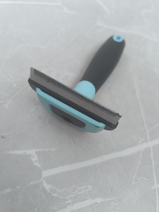 Фурминатор- расчёска для кошек или собак