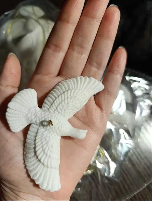 Гълъбите от " Сам в къщи" Безценен подарък! Бижу!