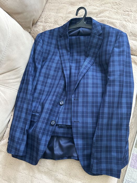 Продам новый костюм