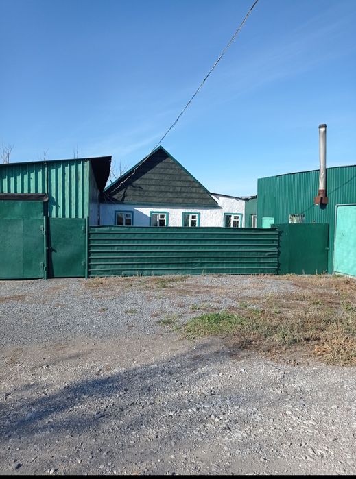 Дом + производственное помещение в частной собственности.