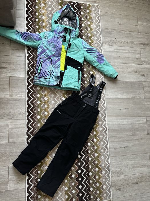 Комбинещон на девочку 8/9 лет