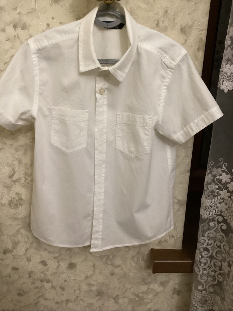 Белая рубашка на мальчикаLC WAIKIKI