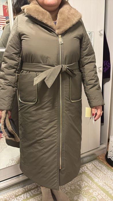 Продается пуховик новый