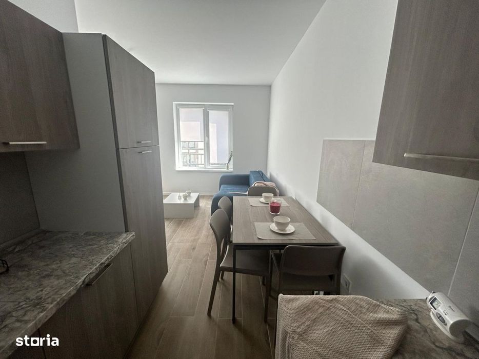 Garsoniera open space intima, etaj 9, cu balcon