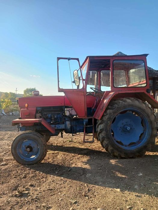 UTB 650 de vanzare impreuna cu remorca basculabila si plug