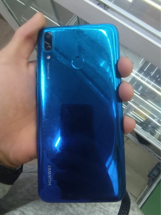 Телефон  Huawei