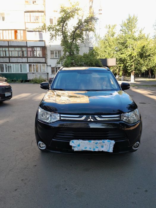 Продам " Мицубисси Оутлендер" , плюс зимняя резина.