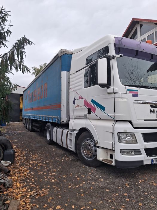MAN TGX 18.440+semiremorca schmitz