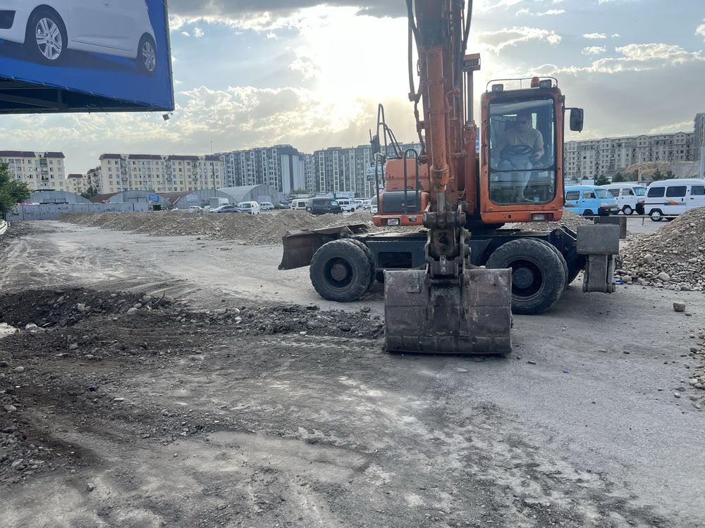 Экскаватор хизмати. Услуги экскаватора, разработка грунта котлована.