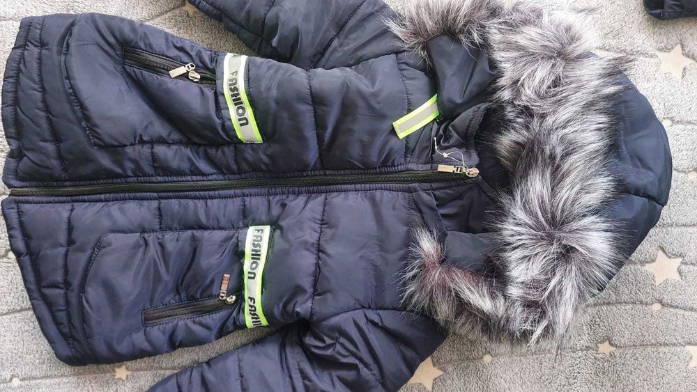 продам пуховик детский новый