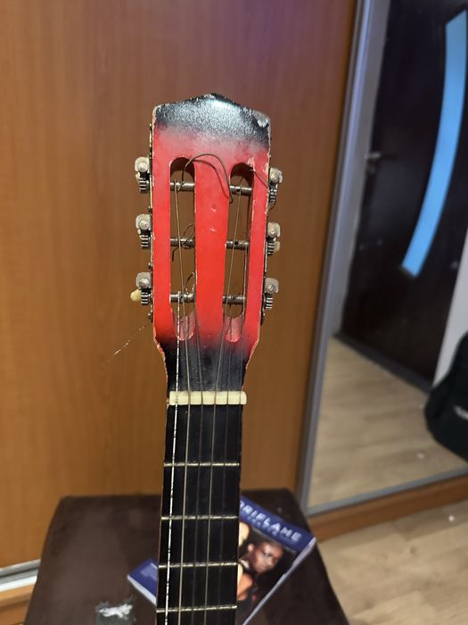 Chitara  acustica  doua la pret de una