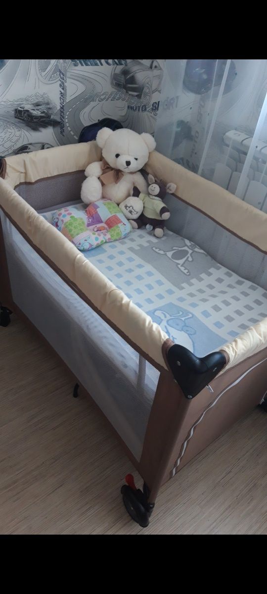 Кроватка-манеж с рождения