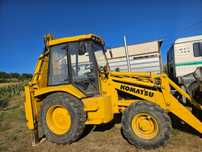 Buldoexcavator Komatsu
