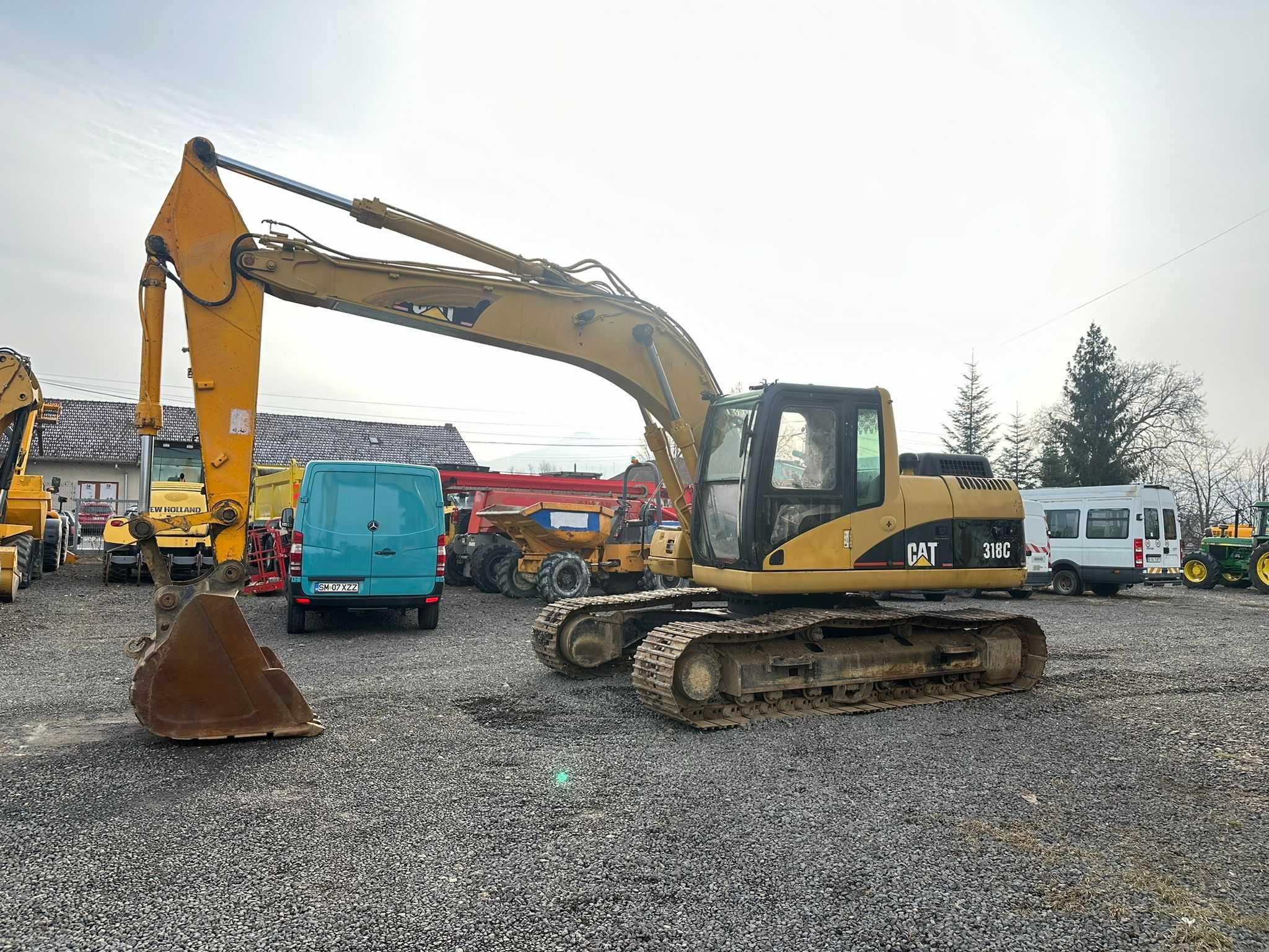 Excavator pe senile Caterpillar 318C , 2010