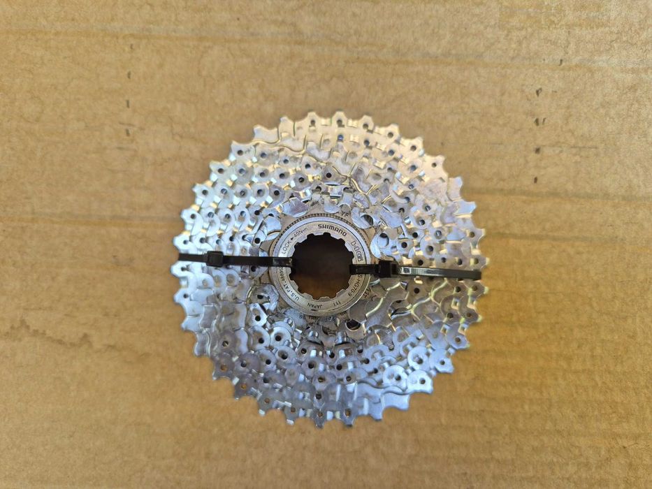 Caseta Shimano 9 pinioane, 11-34T, in stare foarte buna