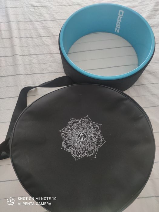 Roată yoga pentru exersarea mușchilor abdominali și ai spatelui