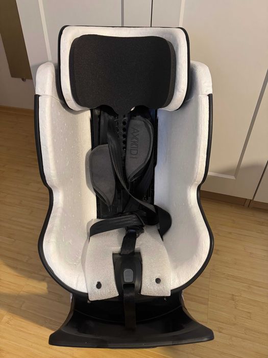 Axkid Стол за кола Spinkid (0-18 кг.)