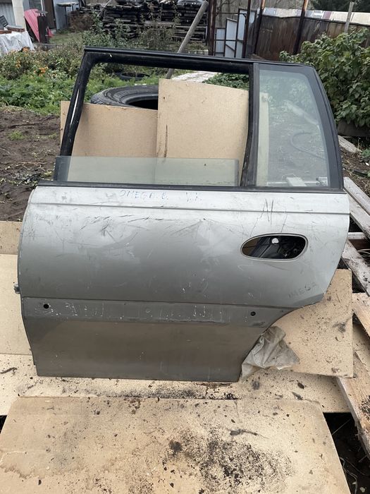 Дверь задняя левая Opel Omega B универсал