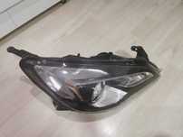 Faruri Opel Astra J halogen originale GM, stânga + dreapta