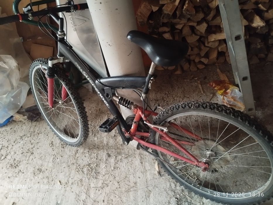 Bicicleta cu suspensii