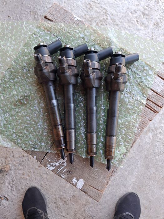 Injectoare  bmw n47  143 cp 2010
