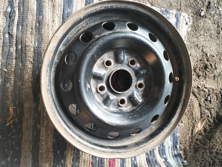 Продам диски от мазды